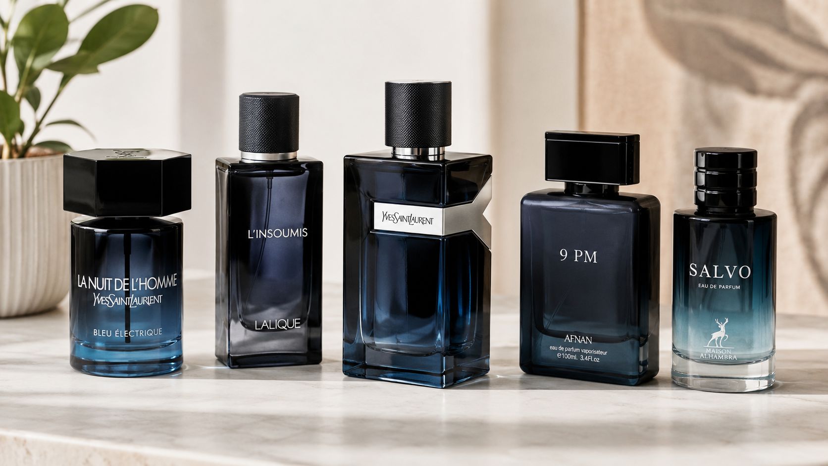 Five different cologne bottles displayed on a marble surface including Yves Saint Laurent and other fragrance brands.