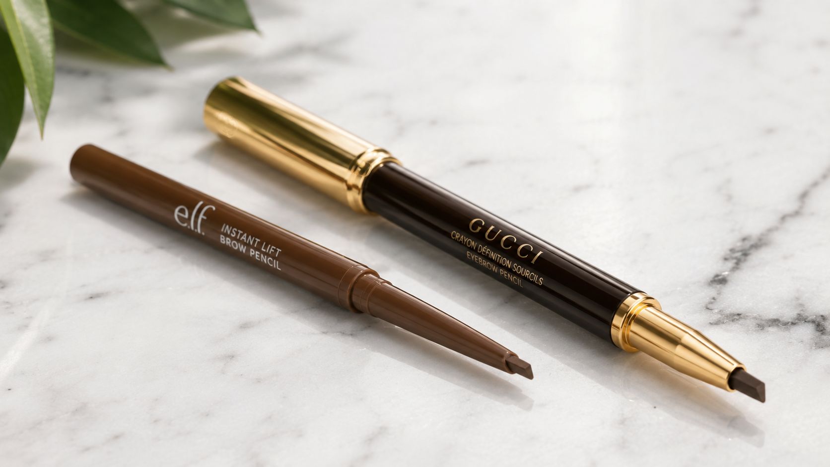 A side-by-side comparison of an affordable e.l.f. brow pencil and a luxury Gucci eyebrow pencil.