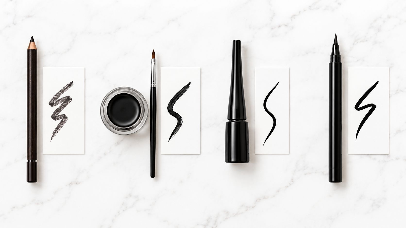 Four different types of black eyeliner products shown with corresponding brush strokes on a white marble background.